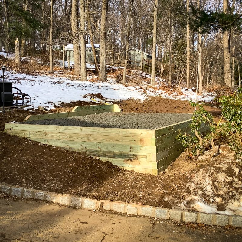 A crushed-stone foundation needed for a shed