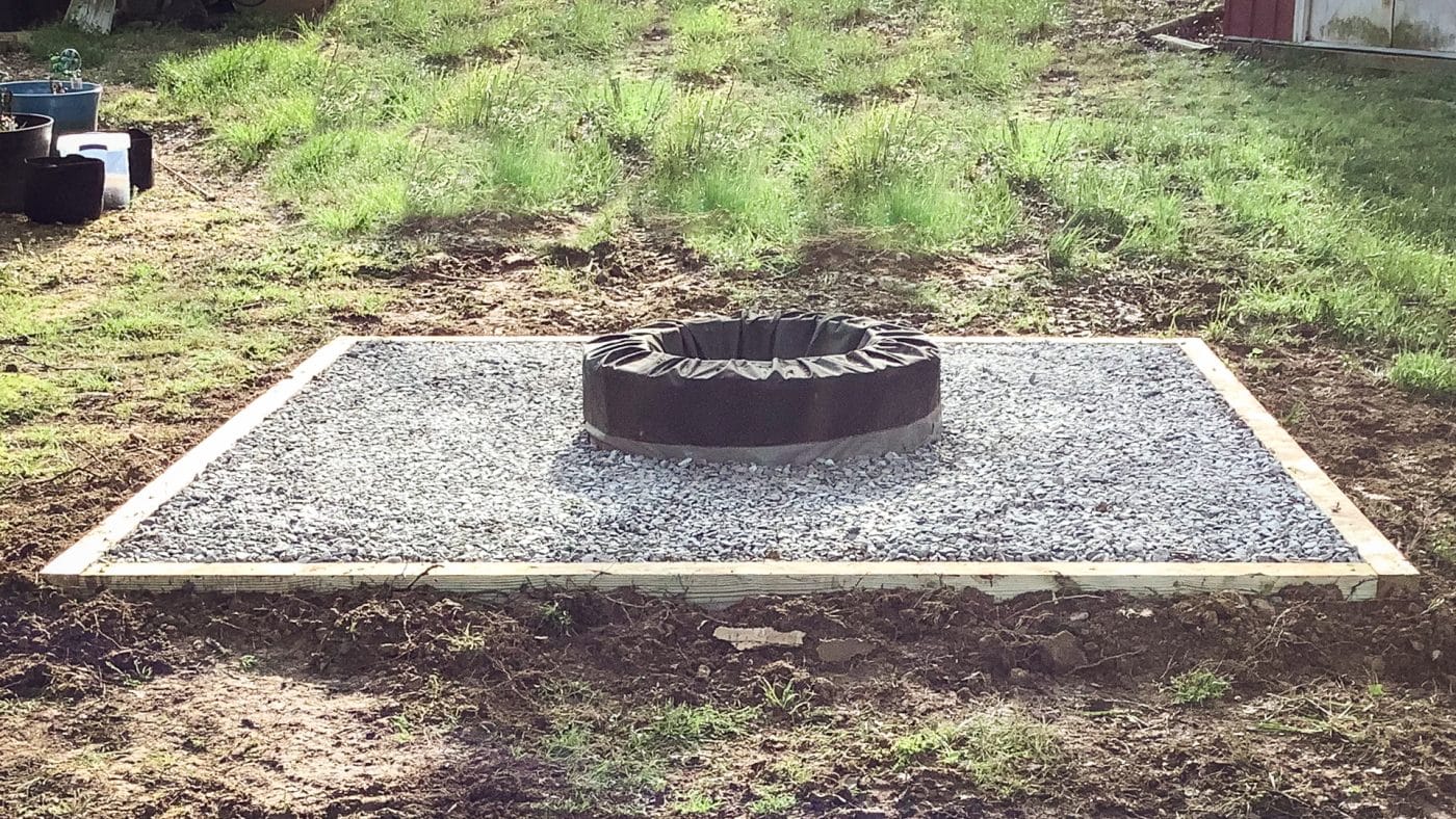 A gravel patio fire pit