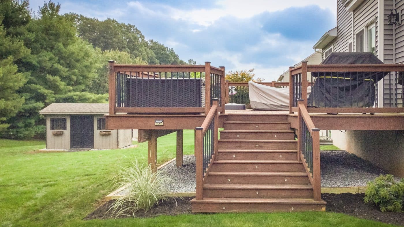 A brown deck with gravel under it