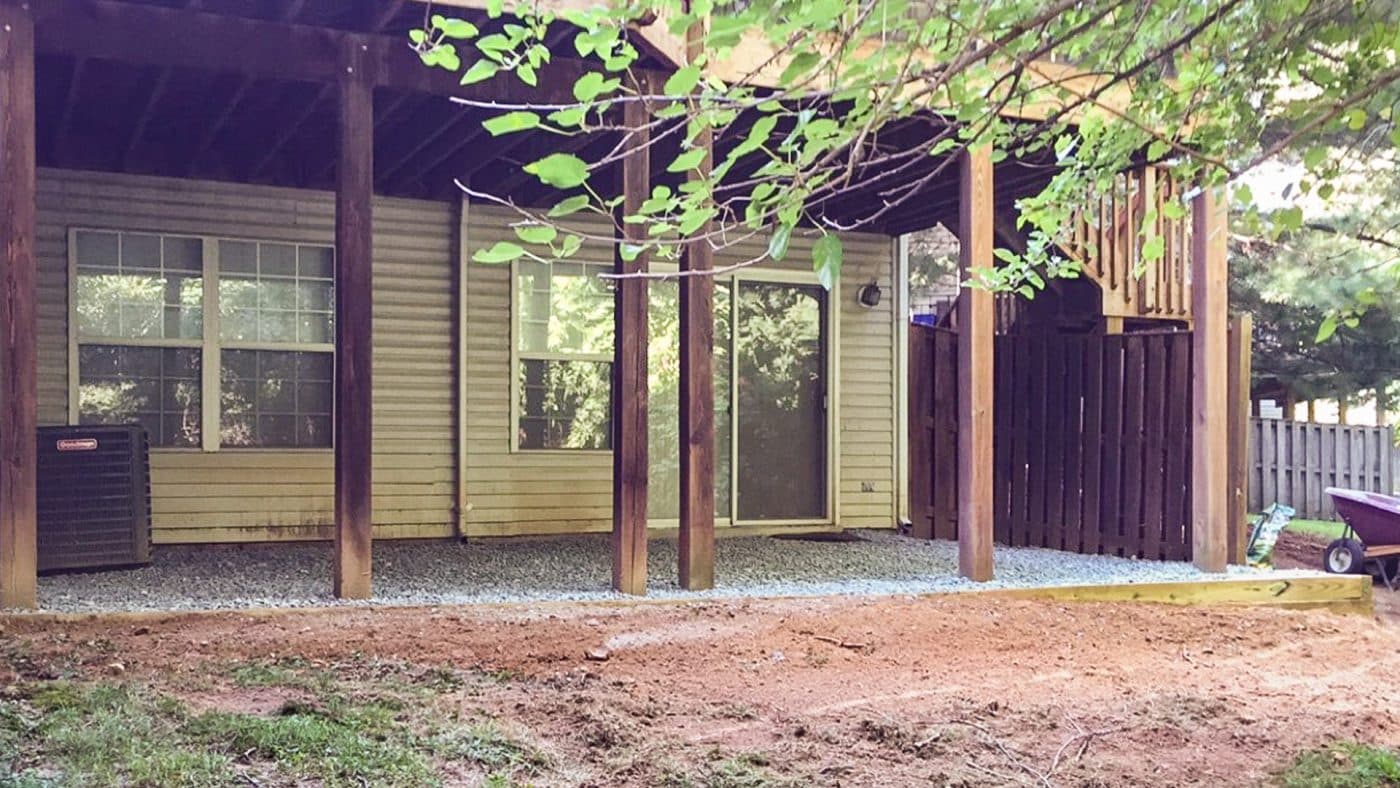 Level gravel under a deck