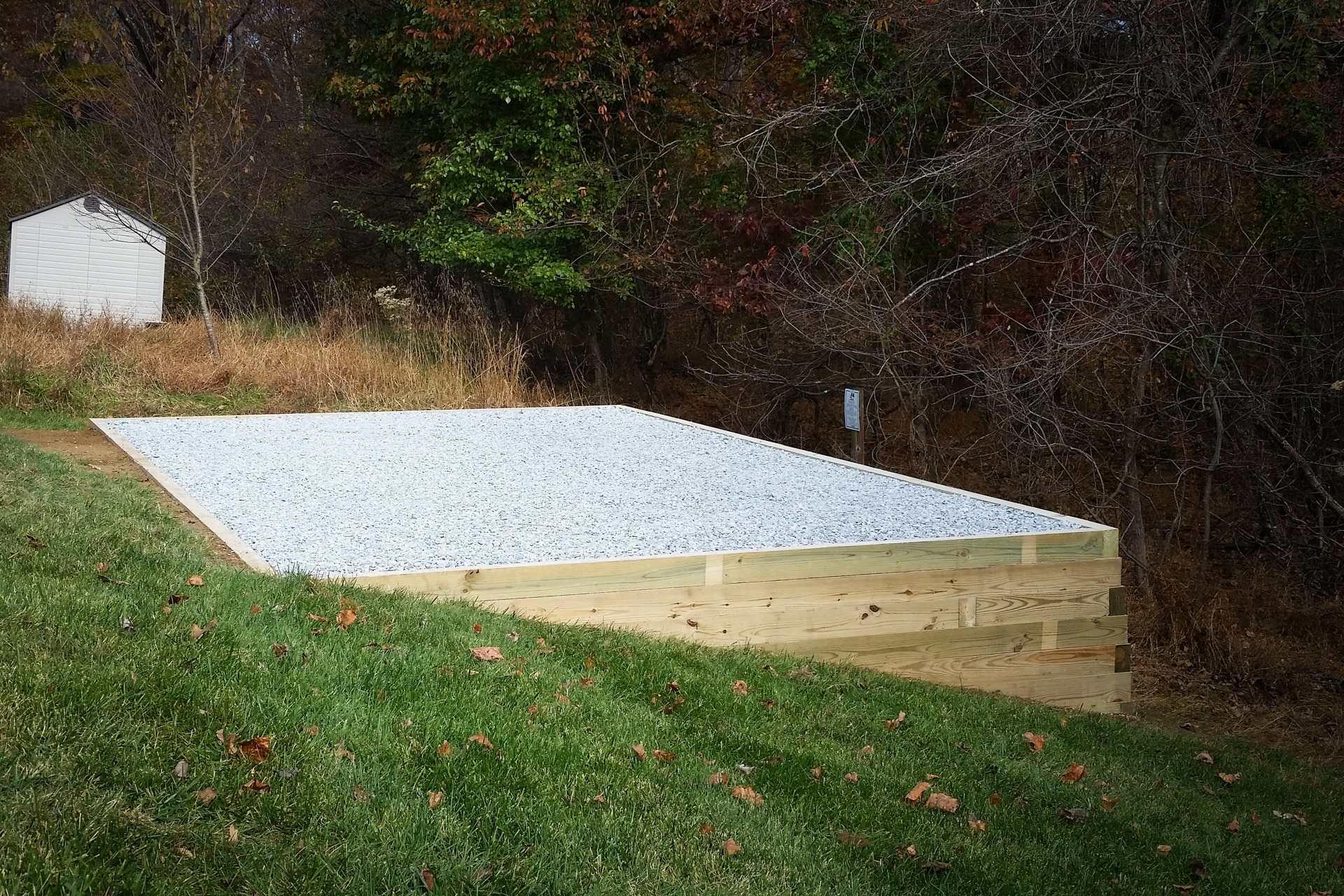 Ground preparation for a shed on the side of a hill