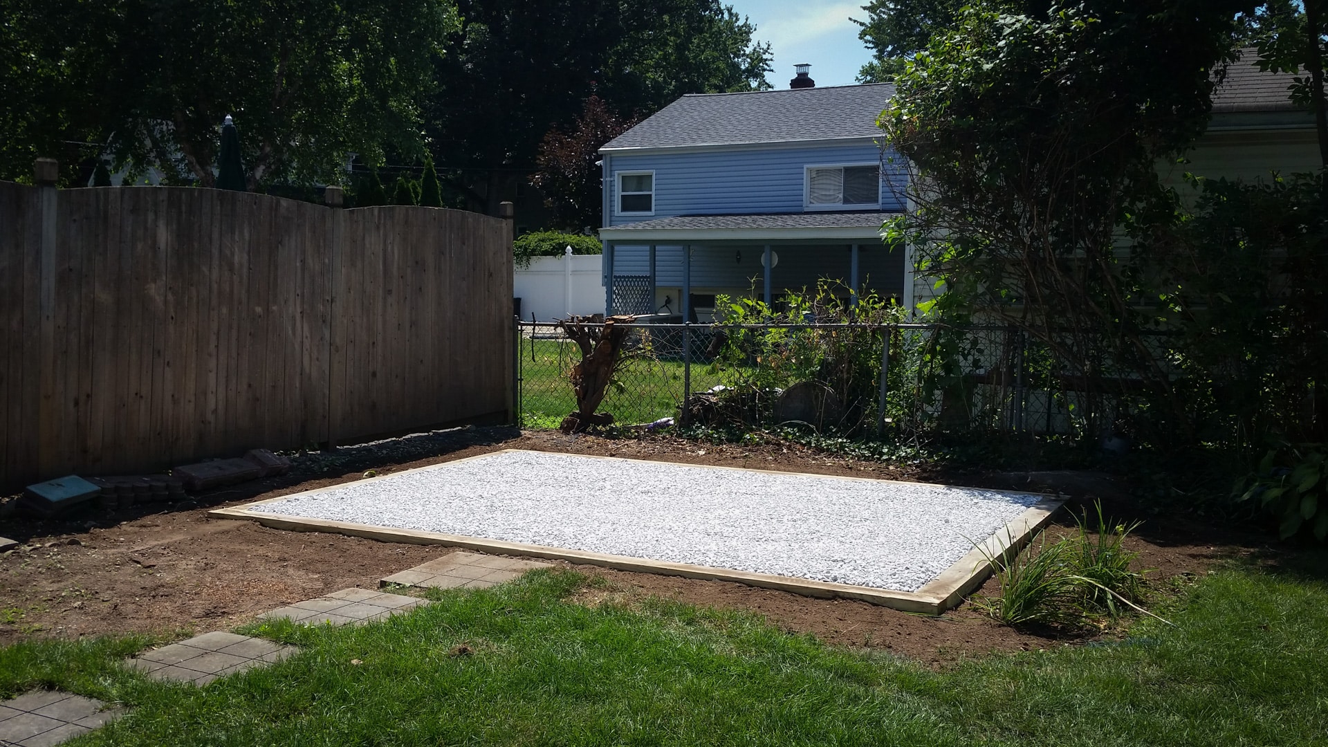 A 10x14 gravel shed pad