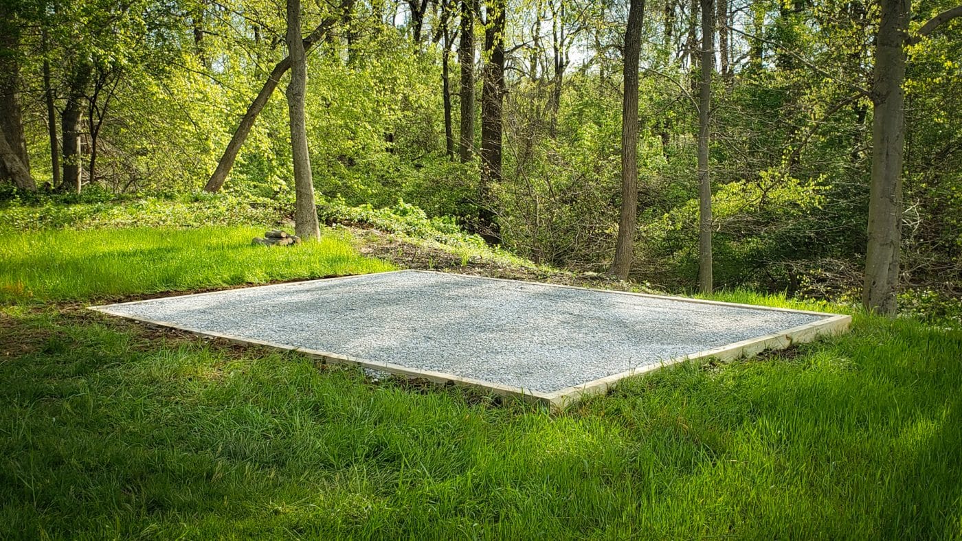 exterior of a high quality gravel foundation for the article how to build a shed base on uneven ground