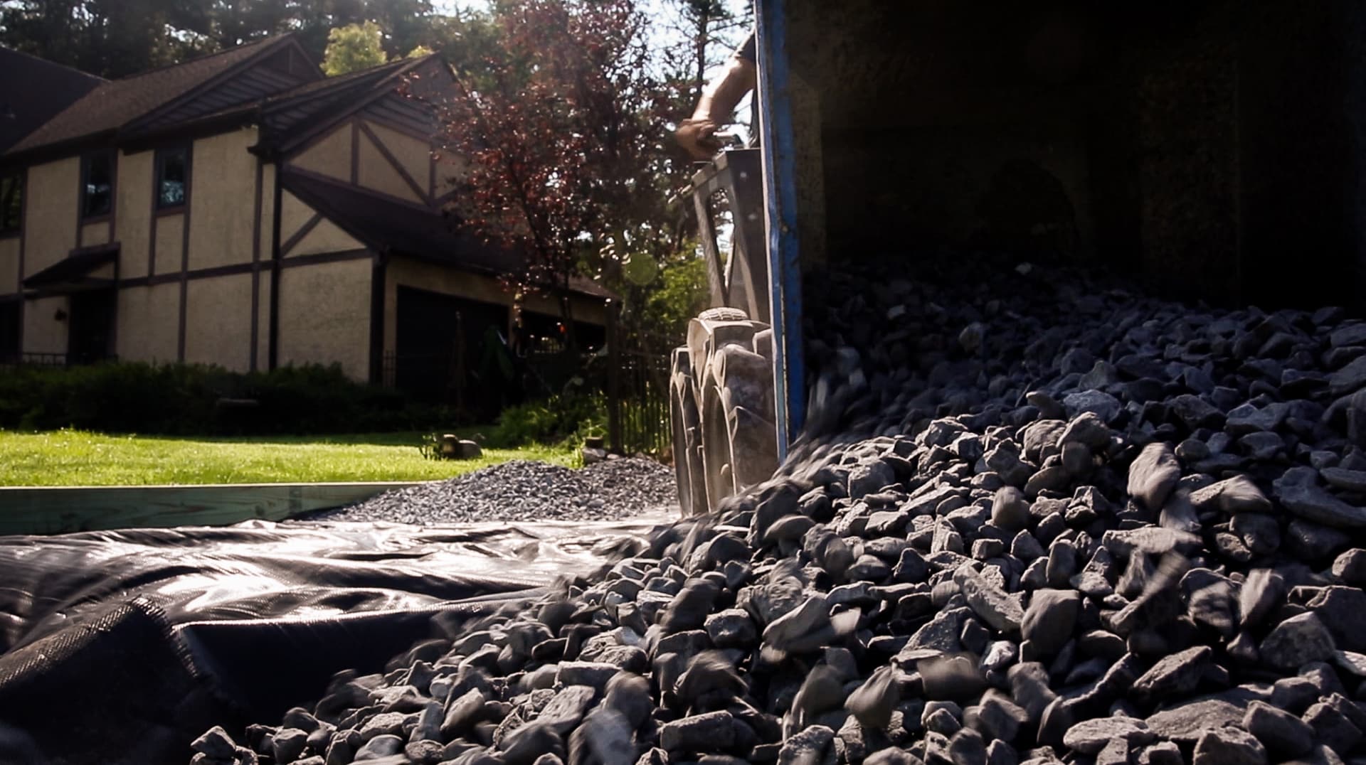 Hauling gravel to install a shed foundation.