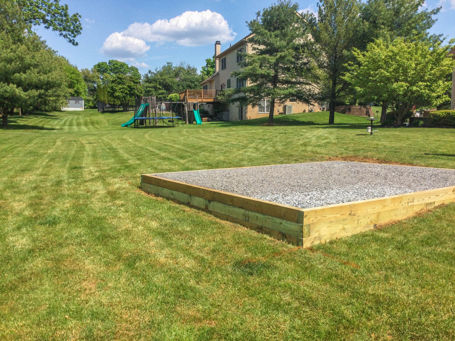 stone shed pad made by site prep