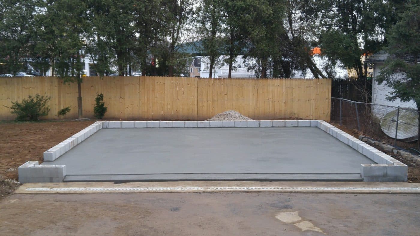 A concrete garage foundation with concrete block footers