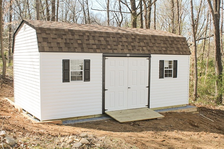 Storage shed on a gravel foundation prepared by Site Preparations, LLC